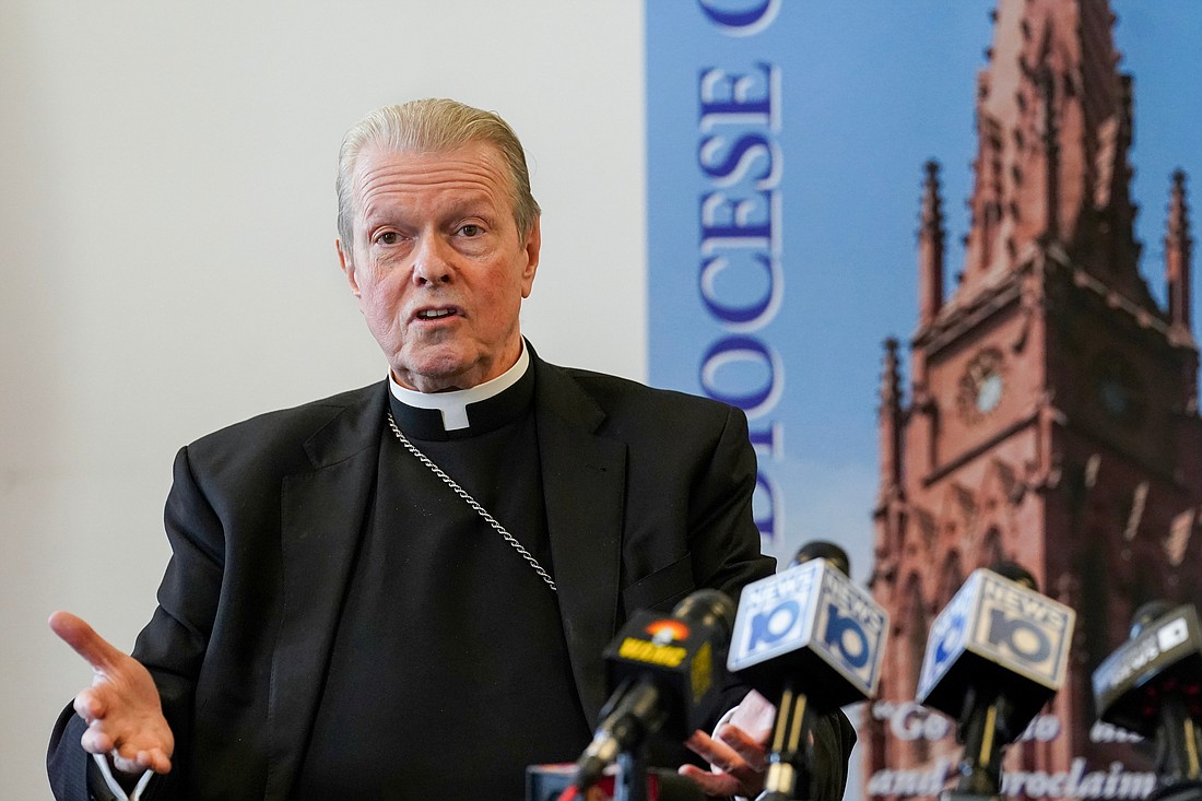 Bishop Edward Scharfenberger, left, speaks during a news conference on Wednesday, March 15, 2023, at the Pastoral Center in Albany, N.Y. The Albany Catholic Diocese filed for Chapter 11.  Cindy Schultz for The Evangelist