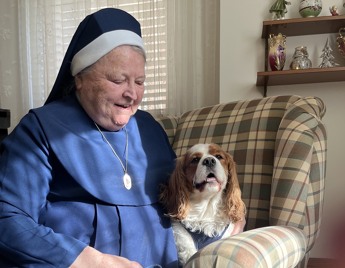 Mother Mary Louise Kane, PBVM, Superior of the Sisters of the Presentation of the Blessed Virgin Mary, is also mother to little Maggie Joy, a 5-year-old King Charles Spaniel, who is loved by all of the convent's sisters. (Emily Benson photo)