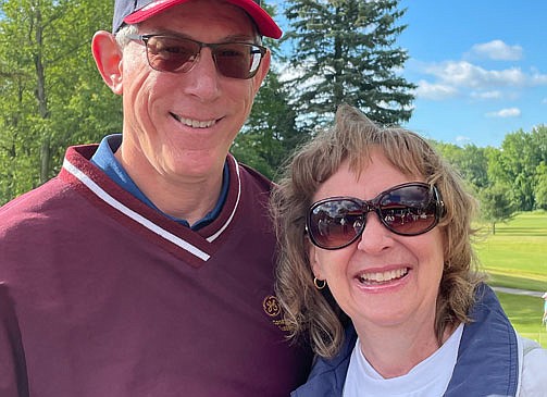 Paula Thibault, a math teacher at Notre Dame-Bishop Gibbons School, is shown with her husband, Bernie. (Photo provided)