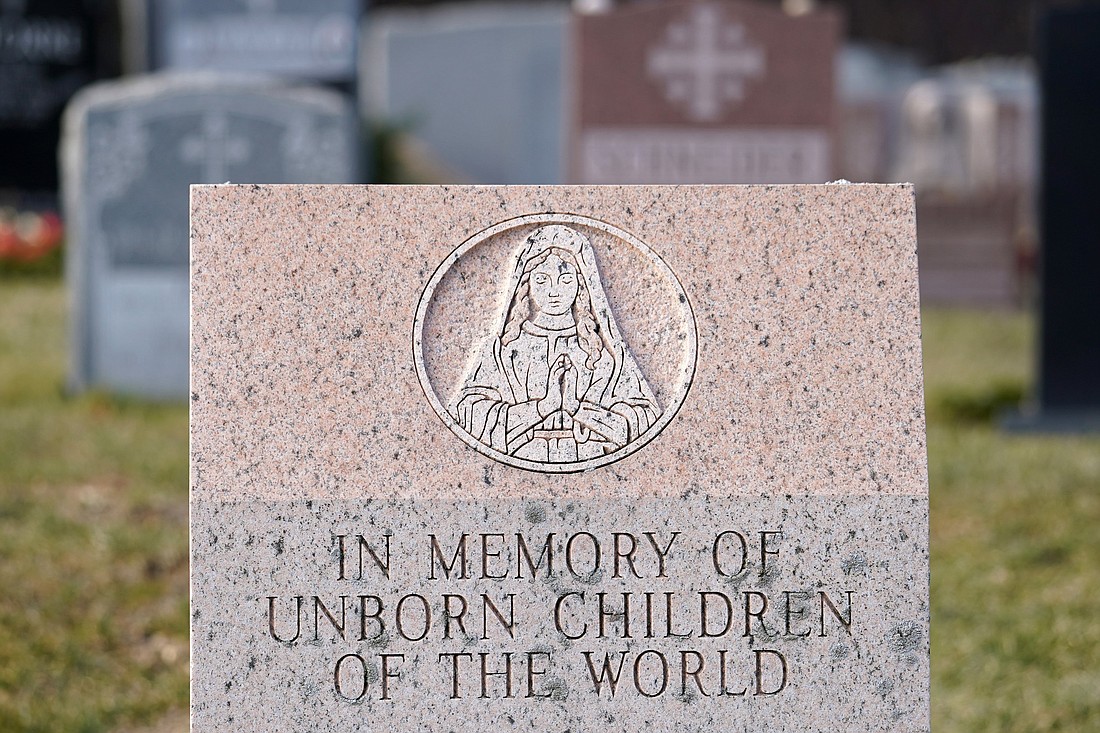 A memorial stone dedicated to the unborn children of the world is seen at St. Patrick Parish Cemetery in Smithtown N.Y., Jan. 22, 2021. (CNS photo/Gregory A. Shemitz)