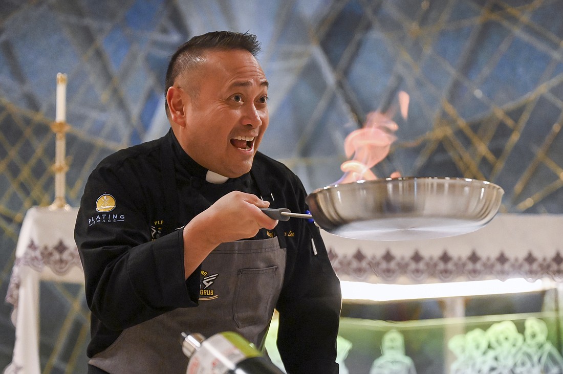 Father Leo Patalinghug, who is a priest, show host and award-winning cook, prepares pasta alla vodka during a special service on Wed. March 30, 2022, at St. Clement’s Church in Saratoga Springs, N.Y.This photo, captured by Cindy Schultz for the Evangelist, won first place in the Feature Photo category for this year's CPA awards.