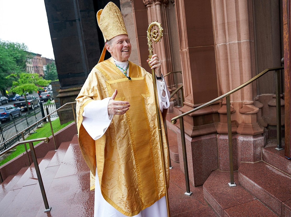 Bishop Edward B. Scharfenberger steps outside to greet parishioners after a Mass that honored his 50 years in the priesthood on Sunday, July 2 at the Cathedral of Immaculate Conception in Albany.  Cindy Schultz for The Evangelist