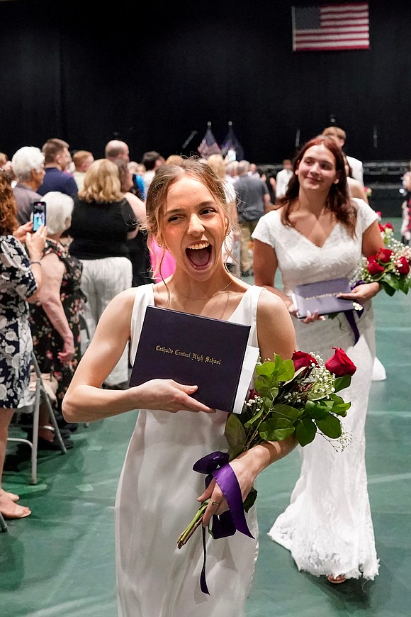 Graduate Lauren Jimenez, center, celebrates the moment following Central Catholic commencement exercises on Saturday, June 24, 2023, at Hudson Valley Community College in Troy, N.Y.  Cindy Schultz for The Evangelist