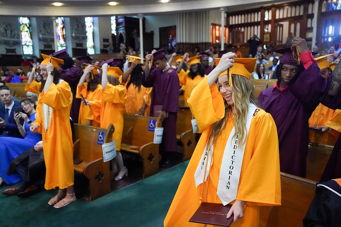 Valedictorian Ava Giordano, right, joins fellow graduates as they turn the tassels during Notre Dame-Bishop Gibbons commencement exercises on Saturday, June 24, 2023, at St. John the Evangelist in Schenectady, N.Y.  Cindy Schultz for The Evangelist