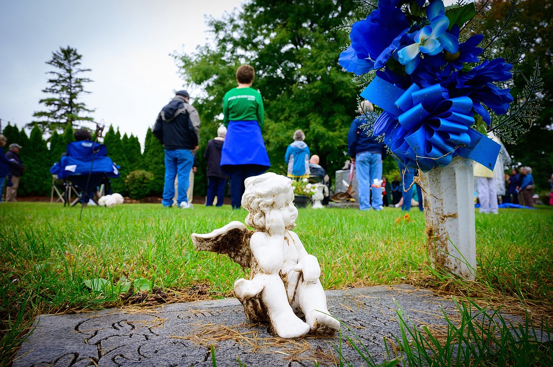 People gather for the National Day of Remembrance for Aborted Children Sept. 12, 2020, at Allouez Catholic Cemetery in Allouez, Wis. During the hourlong outdoor event, participants listened to speakers, recited the rosary and prayed the Divine Mercy Chaplet. On Sept. 9, 2023, services and gatherings were planned at some 225 locations across the country to mark the yearly observance commemorating the souls of children lost to abortion. (CNS photo/Sam Lucero, The Compass)..