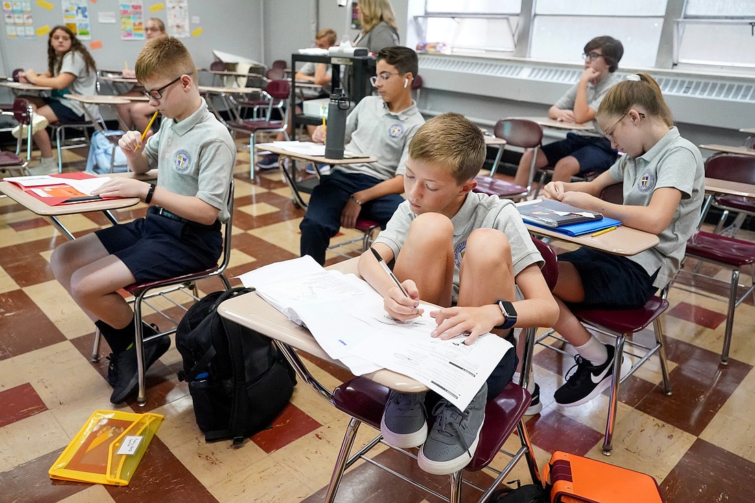 Eighth graders work on an exercise during Spanish class on Sept. 13, 2023 at Saratoga Central Catholic School in Saratoga Springs. Cindy Schultz for The Evangelist