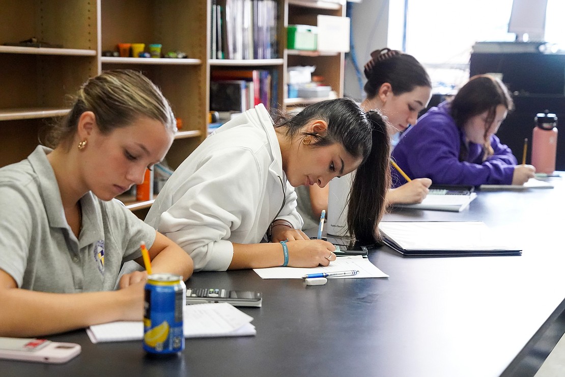 11th- and 12th-grade students work on a math problem during their pre-calculus class on Sept. 13 at Saratoga Central Catholic School in Saratoga Springs. Cindy Schultz for The Evangelist