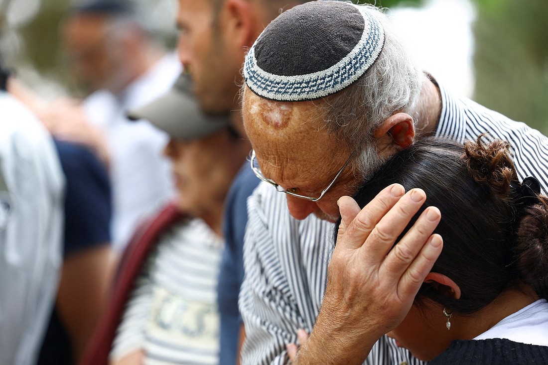 People mourn during the funeral for Israeli Col. Roy Joseph Levy at Mount Herzl Military Cemetery in Jerusalem Oct. 15, 2023. Levy was killed following a deadly infiltration by Hamas gunmen from the Gaza Strip. (OSV News photo/Lisi Niesner, Reuters)