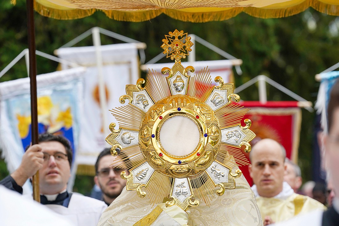 The Monstrance is carried under a canopy for the Eucharistic Procession during the Eucharistic Congress on Saturday, Oct. 21, 2023, at Our Lady of Martyrs Shrine in Auriesville, N.Y.  Cindy Schultz for The Evangelist