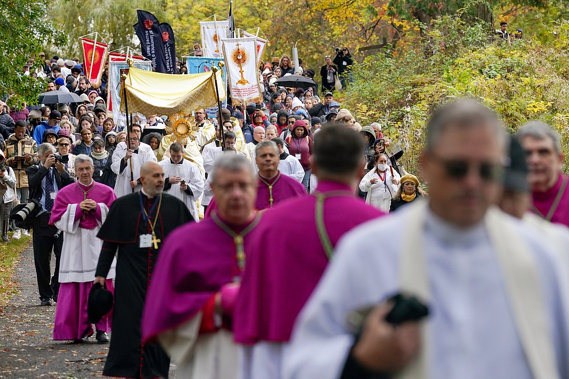 The Monstrance is carried under a canopy as clergy and parishioners take part in the Eucharistic Procession during the Eucharistic Congress on Saturday, Oct. 21, 2023, at Our Lady of Martyrs Shrine in Auriesville, N.Y.  Cindy Schultz for The Evangelist