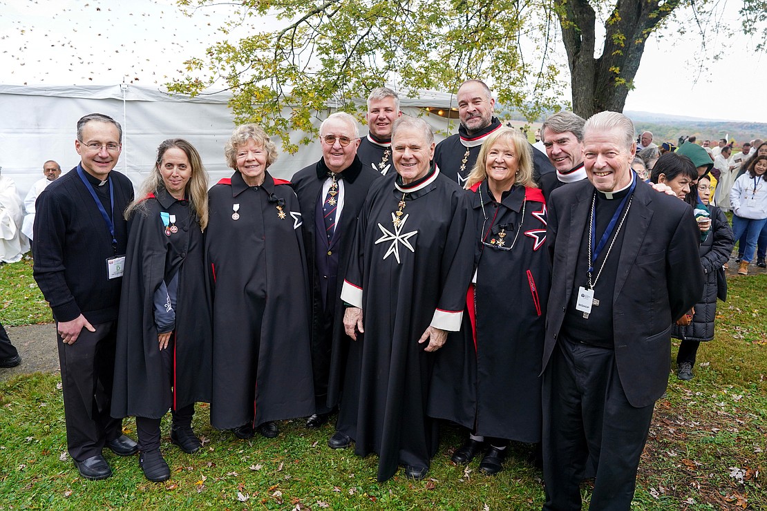 Bishop Edward B. Scharfenberger, (r.) poses with The Order of Malta Upstate Area of America Association during the New York State Eucharistic Congress on Oct. 21 at Our Lady of Martyrs Shrine in Auriesville. Cindy Schultz photo for The Evangelist)