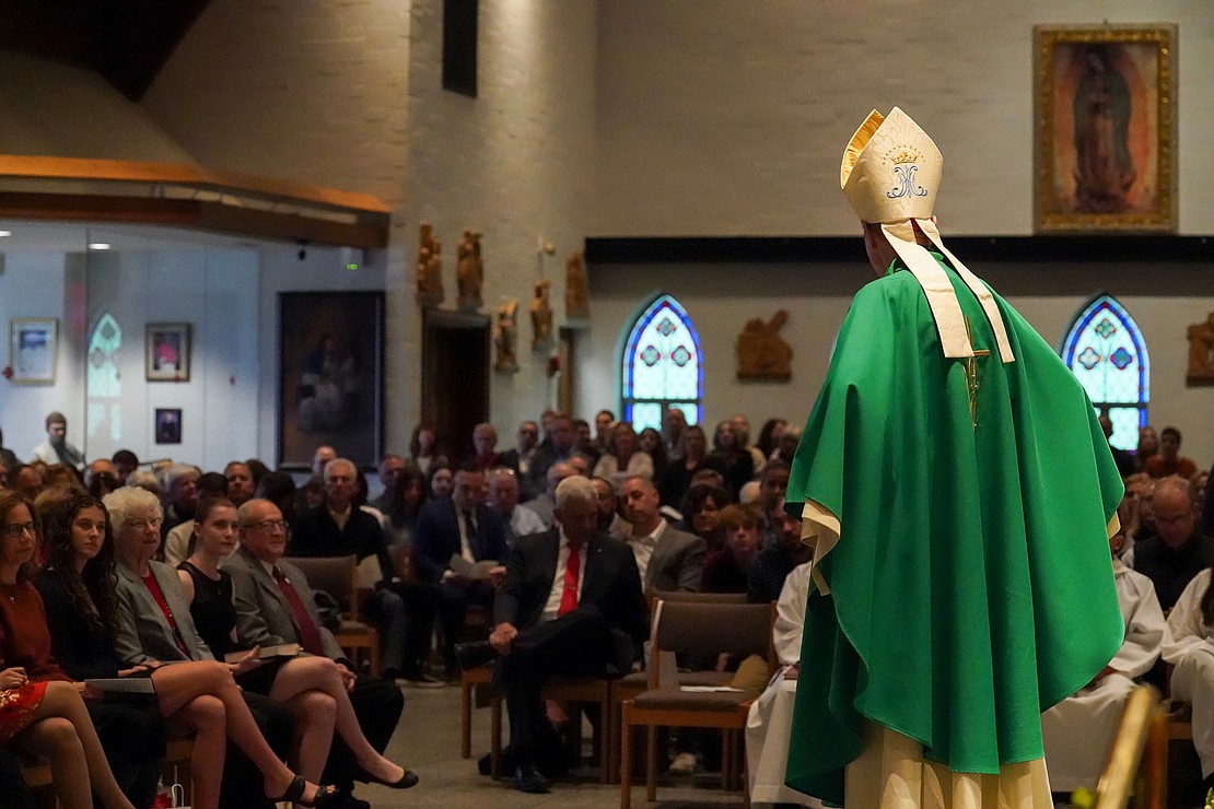 Bishop Edward B. Scharfenberger directs the homily at the candidates for confirmation on Oct. 29 at St. Kateri Tekakwitha Parish in Schenectady. (Cindy Schultz photo for The Evangelist)