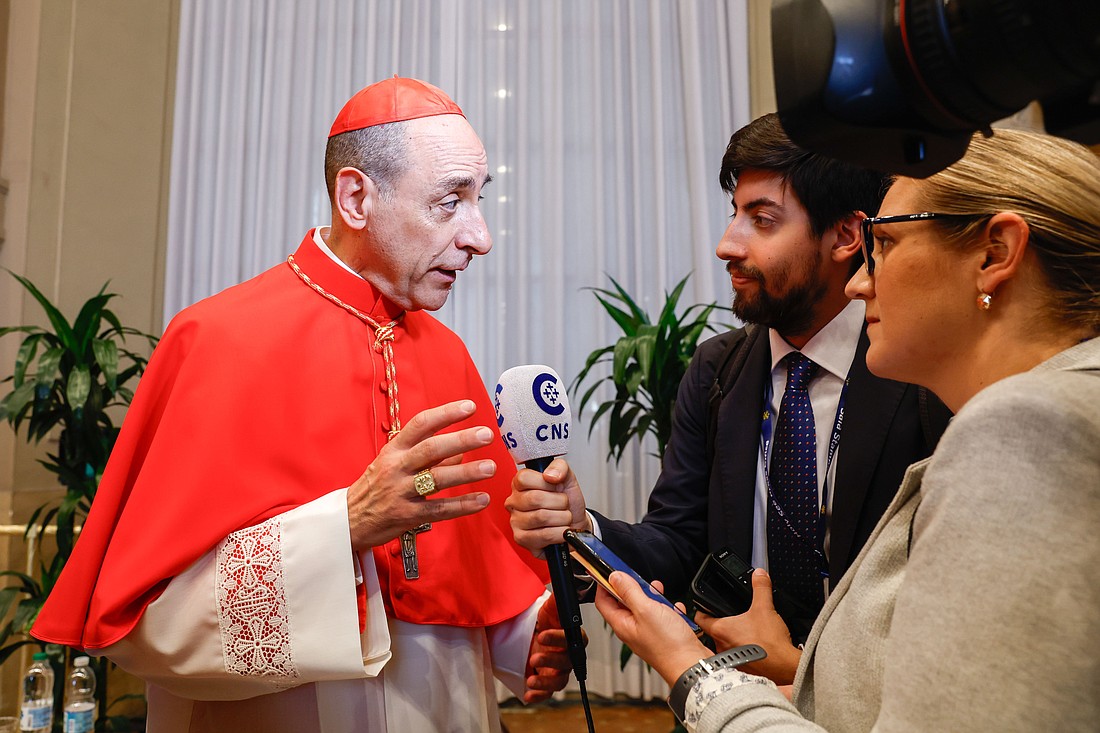 Cardinal Víctor Manuel Fernández comments on changes in the Dicastery for the Doctrine of the Faith, where he serves as prefect, as meets a CNS reporter in the Apostolic Palace at the Vatican after Pope Francis made him a cardinal Sept. 30, 2023. (CNS photo/Lola Gomez)