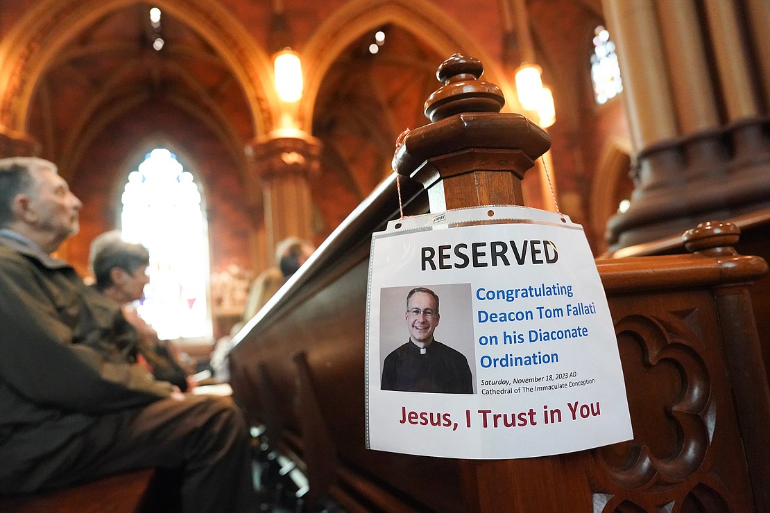 Pews are reserved for family members of candidate Tom Fallati for his ordination to become a deacon on Nov. 18 at the Cathedral of the Immaculate Conception in Albany. (Cindy Schultz photo for The Evangelist)