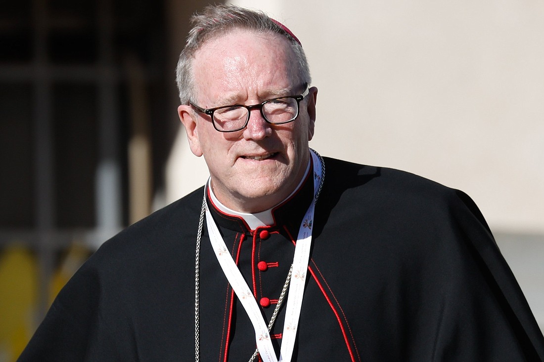 Bishop Robert E. Barron of Winona-Rochester, Minn., arrives for the first working session of the assembly of the Synod of Bishops at the Vatican Oct. 4, 2023. (CNS photo/Lola Gomez)