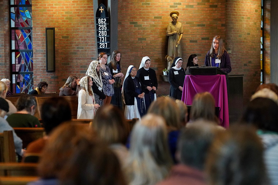 Sisters and parishioners take turns leading the rosary prayers during the Unleashing Love Women’s Conference on Dec. 9 at St. Pius X Church in Loudonville.  (Cindy Schultz photo for The Evangelist)