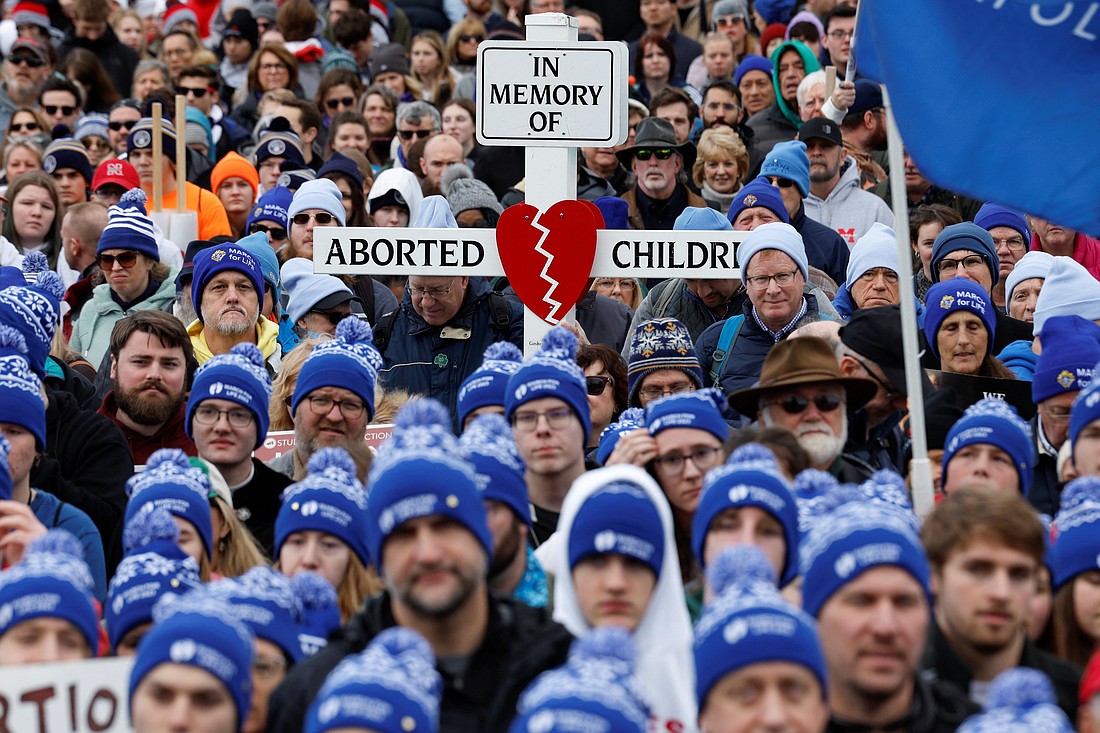 Pro-life demonstrators take part in the annual March for Life rally in Washington Jan. 20, 2023, for the first time since the U.S. Supreme Court overturned Roe v. Wade abortion decision. A lawsuit has been filed against the Smithsonian and the National Archives on behalf of students allegedly kicked out of the museums for wearing pro-life hats during their visit to Washington. (OSV News photo/Evelyn Hockstein, Reuters)