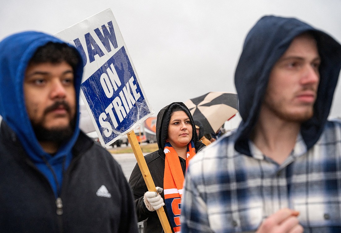 United Auto Worker members picket General Motors outside the engine plant in Spring Hill, Tenn., Oct. 30, 2023. The same day the UAW announced the Big Three automakers had reached a tentative agreement with the labor union for higher wages for workers, cost of living increases and creation of more jobs. (OSV News photo/Seth Herald, Reuters)