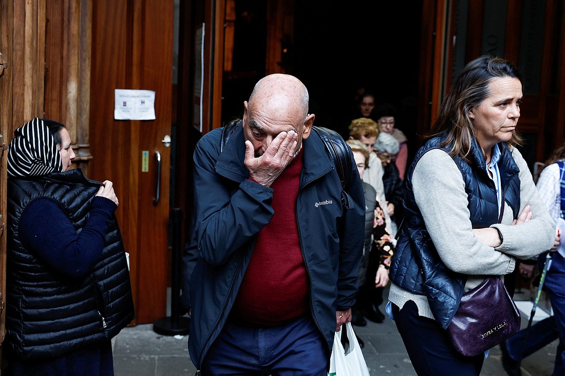 A man reacts while leaving Santiago Cathedral in Bilbao, Spain,  after a Mass celebrated March 24, 2023, to recognize and apologize to victims of sexual abuse within the Catholic Church. The Mass was concelebrated by Bishop Joseba Segura of Bilbao and Father Josu Lopez Villalba, a victim of sexual abuse. (OSV News photo/Vincent West, Reuters)