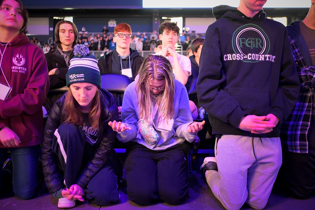 Young people pray during the first-ever Life Fest at the Entertainment & Sports Arena in Washington Jan. 20, 2023. The Sisters of Life and Knights of Columbus announced Dec. 21 that they will be teaming up for a second year to host Life Fest in conjunction with the National March for Life in Washington in January. (OSV News photo/Jeffrey Bruno, Knights of Columbus)
