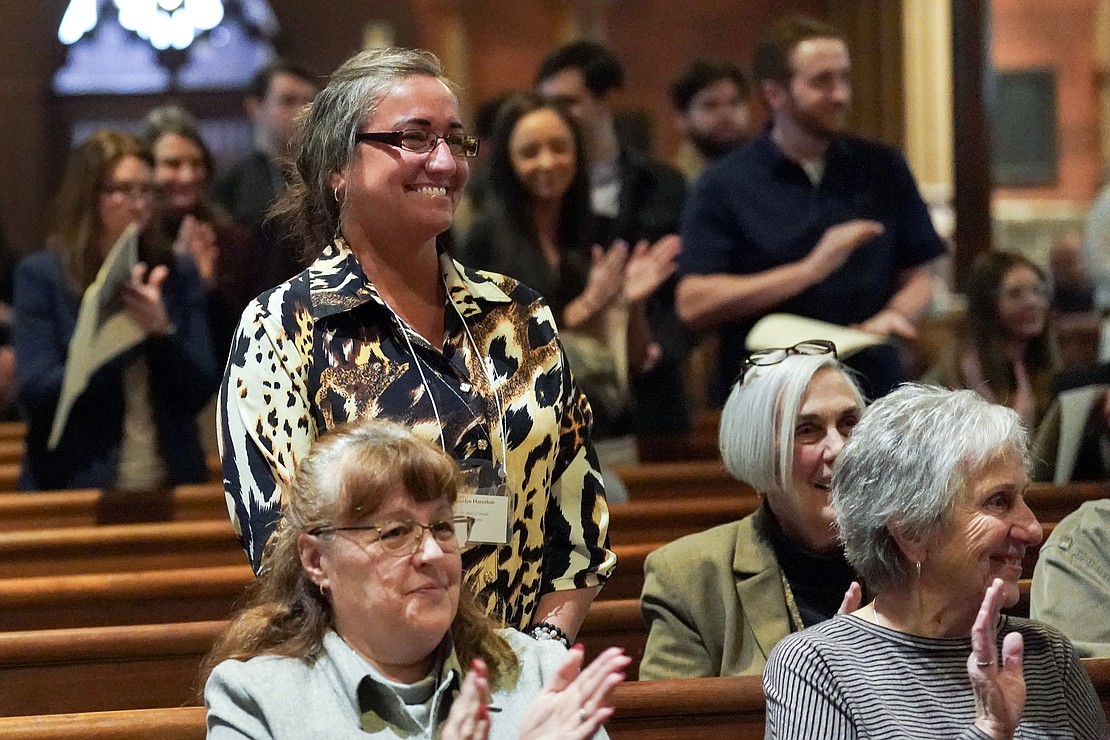 Jocelyn Hanrahan of St. Mary’s Church in Oneonta, center, stands with fellow catechumens when they are declared members of the elect during the Rite of Election on Feb. 18 at the Cathedral of the Immaculate Conception in Albany. (Cindy Schultz photo for The Evangelist)
