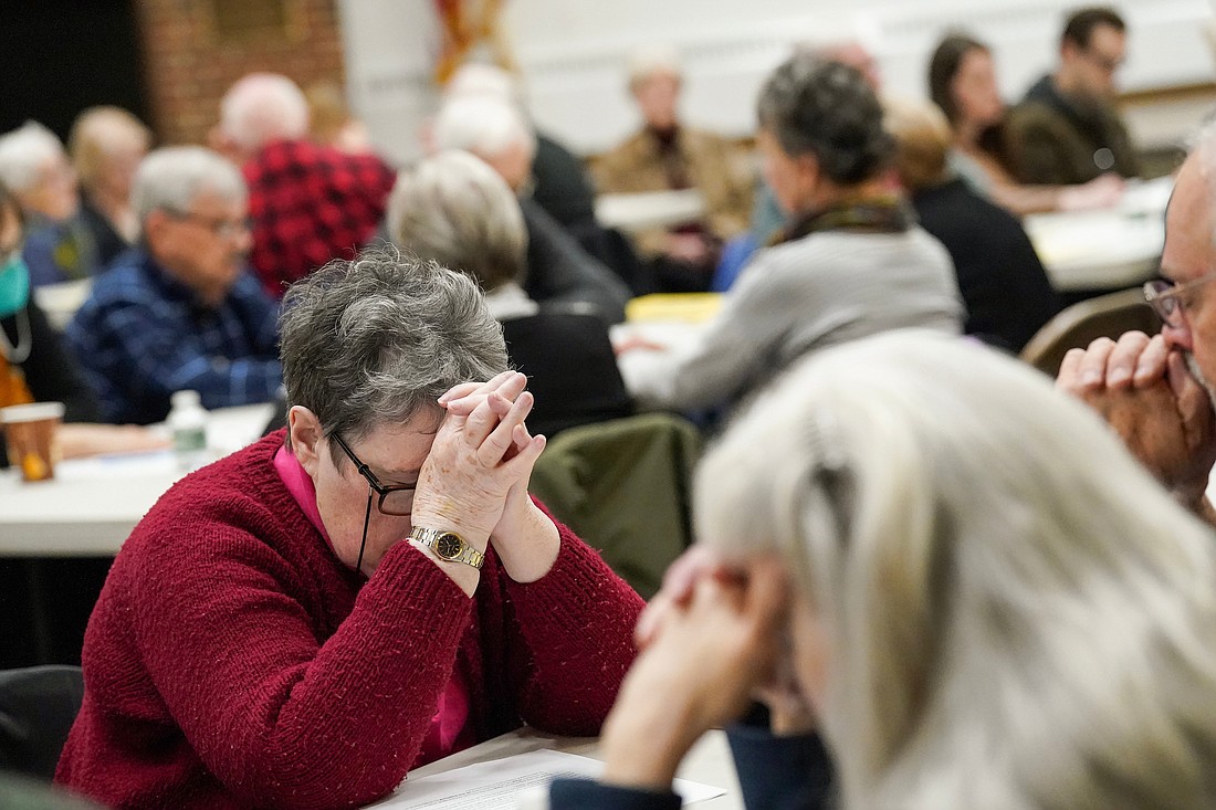 Mary Stearns, St. Michael’s in South Glens Falls, lower left, prays during Synod Sessions “Conversations in the Spirit” on Wednesday, March 6, 2024, at Our Lady of Annunciation in Queensbury N.Y.  Cindy Schultz for The Evangelist
