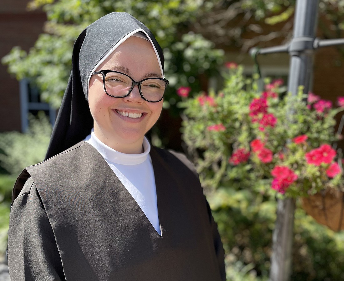 Sister Michelle Elizabeth Marie Nicosia, O.Carm., stands in the courtyard of the Mother Angeline McCrory Manor in Columbus, Ohio. Sister Michelle Elizabeth joined the Carmelite Sisters for the Aged and Infirm in 2022, who assist at the Teresian House in Albany and other nursing homes across the country. (Provided photo)