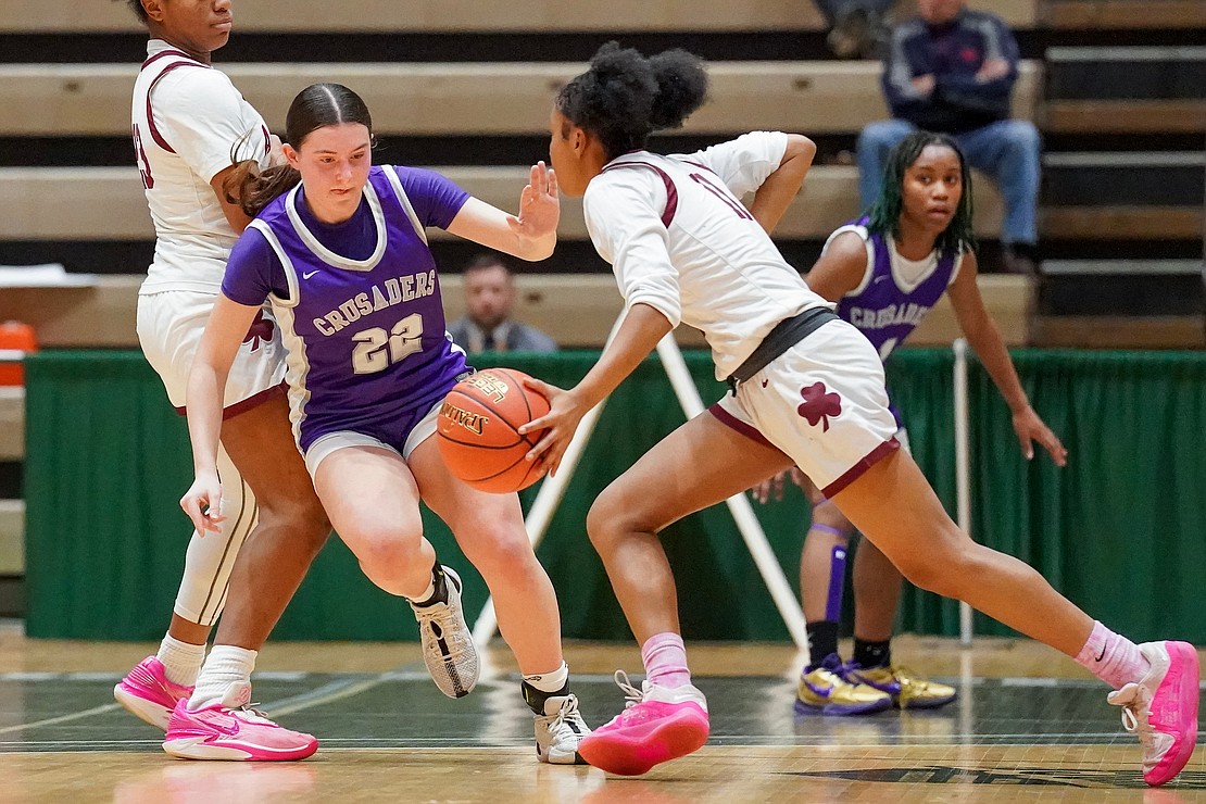 Catholic Central’s Gabriella DiBacco left, defends as Aquinas Institute’s Loren Green controls the ball during in their Class A semifinal basketball game on Friday, March 15, 2024, at Hudson Valley Community College in Troy, N.Y. CCS wins 63-46.  Cindy Schultz for The Evangelist