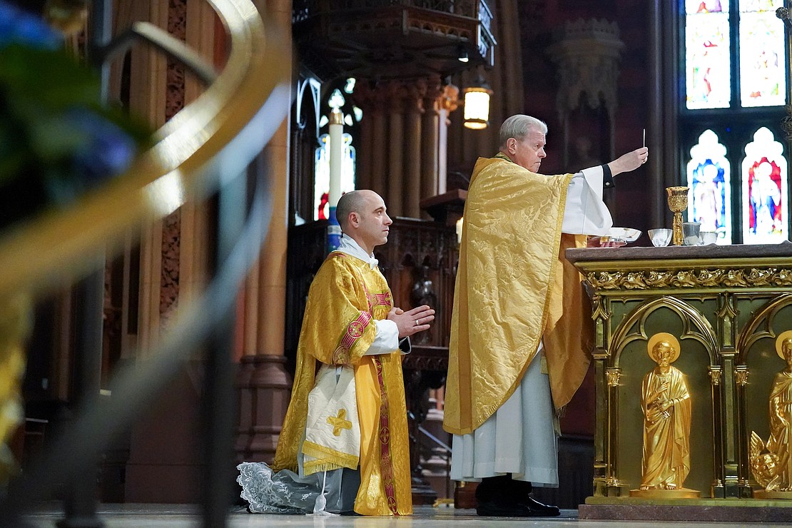 Bishop Edward B. Scharfenberger blesses the gifts for communion during Easter Mass on Sunday, March 31, 2024, at the Cathedral of Immaculate Conception in Albany, N.Y.  Cindy Schultz for The Evangelist
