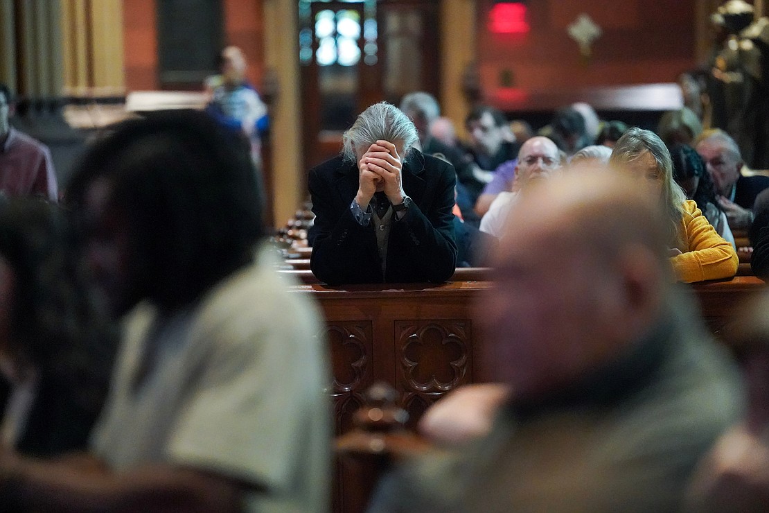 Parishioners pray during Easter Mass on Sunday, March 31, 2024, at the Cathedral of Immaculate Conception in Albany, N.Y.  Cindy Schultz for The Evangelist