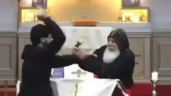 A screenshot from a livestream video shows a man attacking Assyrian Orthodox Bishop Mari Emmanuel at the altar of Christ the Good Shepherd Church in Wakeley, a western suburb of Sydney, April 15, 2024. (OSV News screenshot/via The Catholic Weekly)