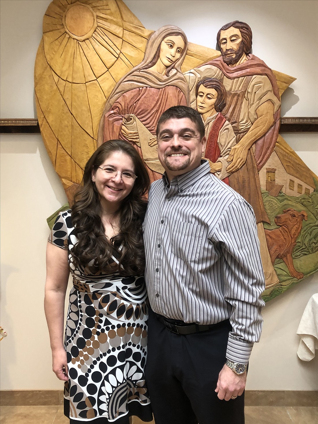 Eric Ramirez, shown with his wife, Penelope Ortega, at Corpus Christi Church in Round Lake, their home parish, said he could not have made the journey to the permanent diaconate without his wife: ‘Penelope has always been part of the formation. I have been very well supported by her, and it has been something that we have done together. … it has been for the two of us.’ (Mike Matvey photo)