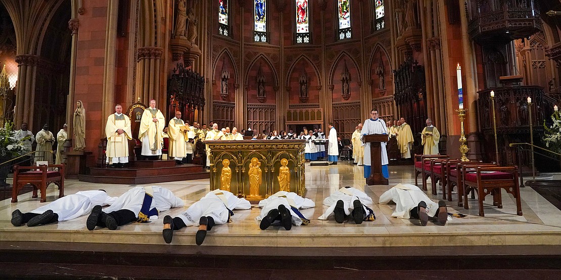 The candidates for the combined Ordination of Priests and Deacons lay in supplication on Saturday, May 18, 2024, at The Cathedral of the Immaculate Conception in Albany, N.Y.  Cindy Schultz for The Evangelist