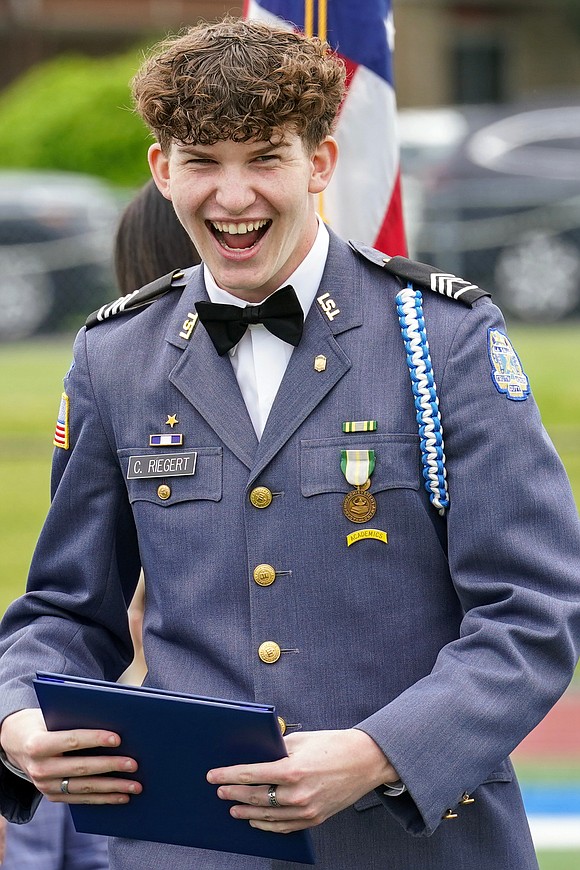 Graduate Christian Riegert cheers when he receives his diploma during commencement exercises on Saturday May 18, 2024, at La Salle Institute in Troy, N.Y.  Cindy Schultz for The Evangelist