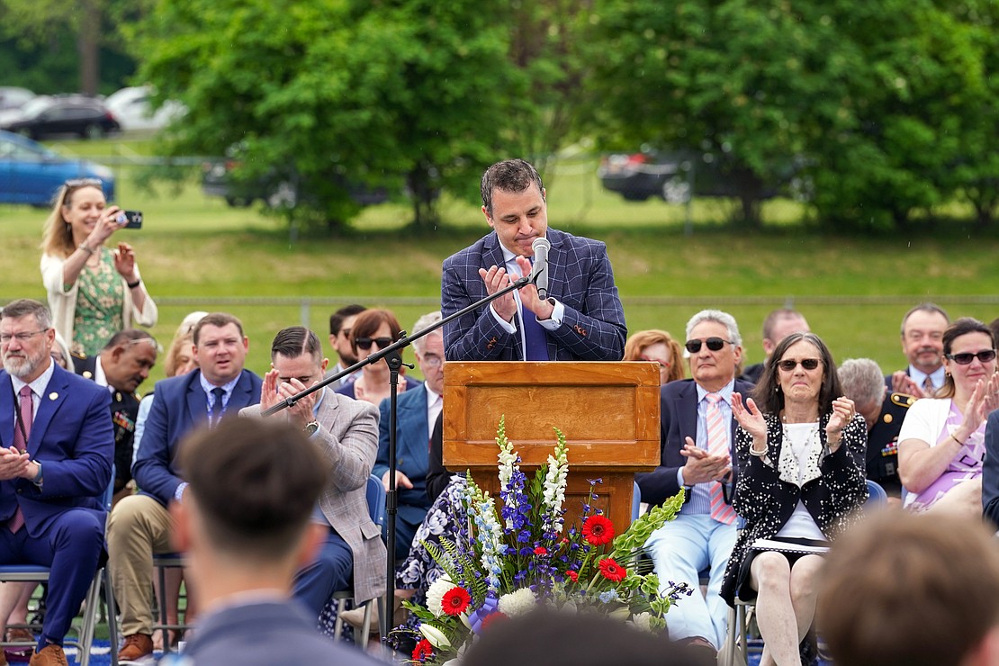 Principal Steven Sgambelluri, center, applauds the Class of 2024 as he delivers closing remarks during commencement exercises on Saturday May 18, 2024, at La Salle Institute in Troy, N.Y.  Cindy Schultz for The Evangelist