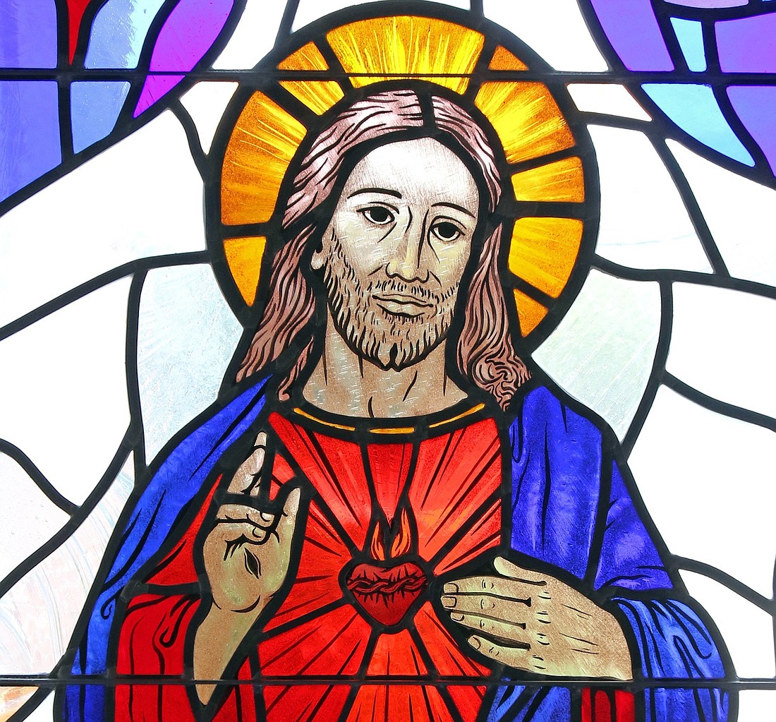 The Sacred Heart of Jesus is depicted in a stained-glass window at St. Patrick Church in Smithtown, N.Y. (OSV News photo/CNS file, Gregory A. Shemitz)