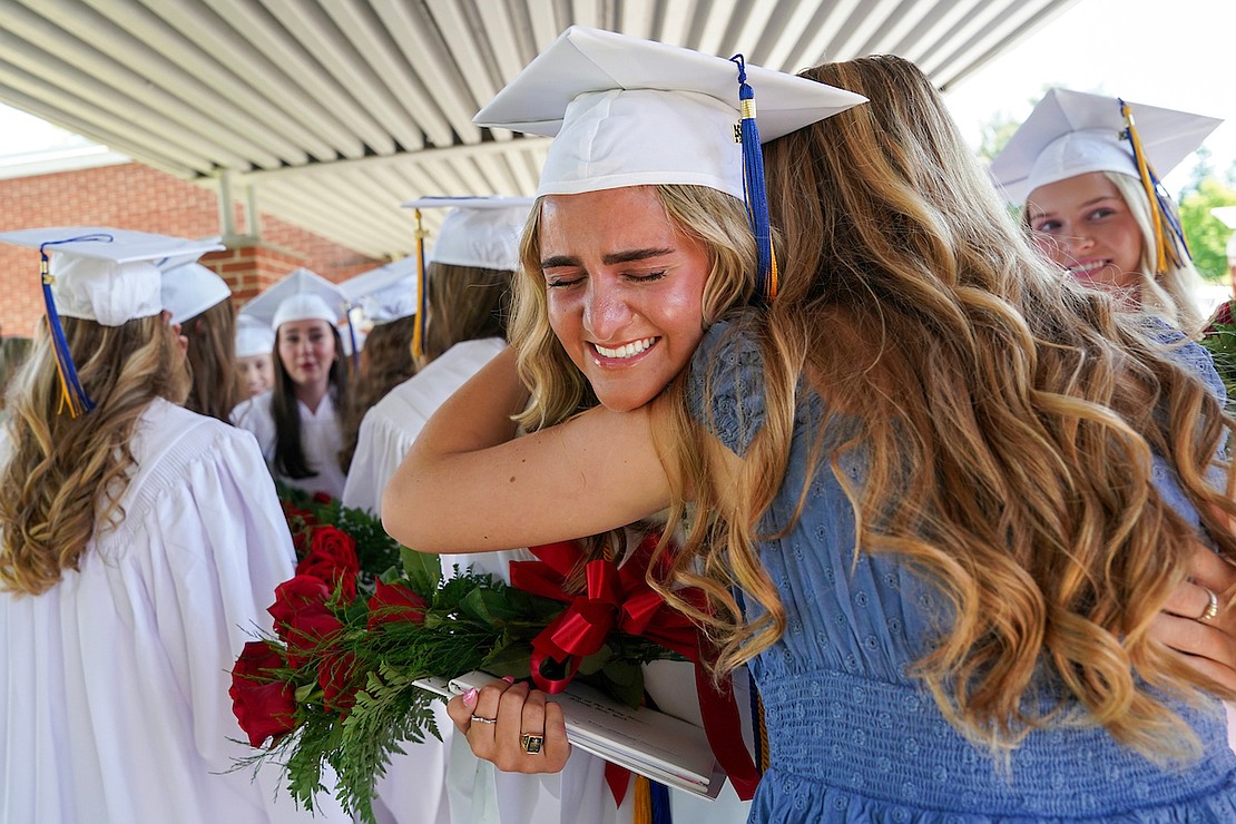 Graduate Kylie McLaughlin celebrates the moment after commencement exercises on Friday May 24, 2024, at the Academy of the Holy Names in Albany, N.Y.  Cindy Schultz for The Evangelist