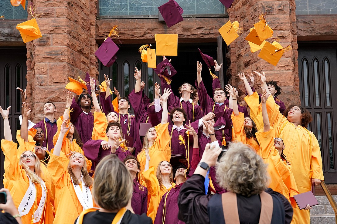 The graduating class of 2024 toss their caps following Notre Dame – Bishop Gibbons commencement exercises on Saturday, June 8, 2024, at St. John the Evangelist Church in Schenectady, N.Y.  Cindy Schultz for The Evangelist