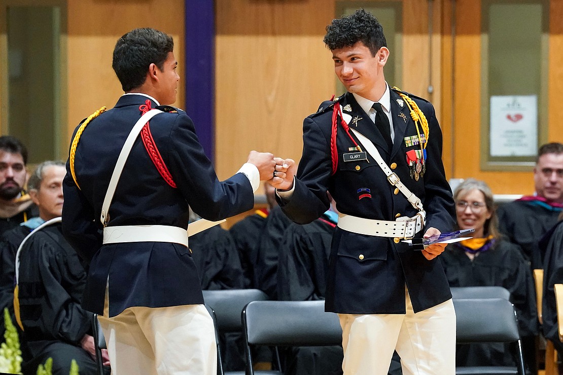 Graduates Ralston Frattarola, left, and Giovanni celebrate their shared Kevin Murphy 73 Memorial Scholarship Award during commencement exercises on Friday, May 31, 2024, at Christian Brothers Academy in Colonie, N.Y.  Cindy Schultz for The Evangelist