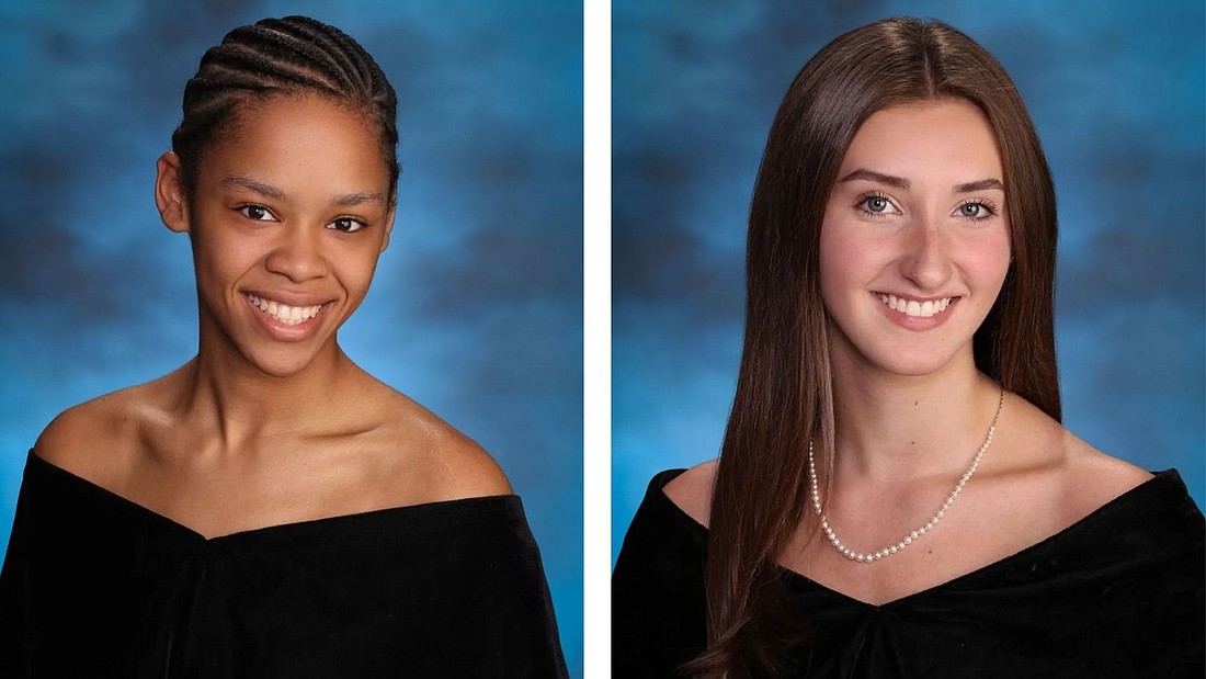 Sophia Ellis (l.), valedictorian, and Emily Wheland, salutatorian, for Catholic Central School.