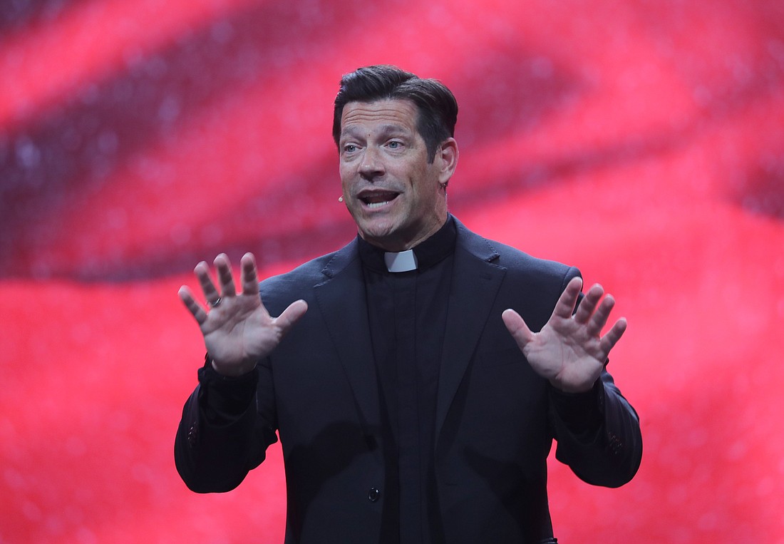 Father Mike Schmitz, director of Youth and Young Adult Ministry for the Diocese of Duluth, Minn., as well as the chaplain for the Newman Center at the University of Minnesota-Duluth, speaks during the second revival night July 18, 2024, of the National Eucharistic Congress at Lucas Oil Stadium in Indianapolis. (OSV News photo/Bob Roller)