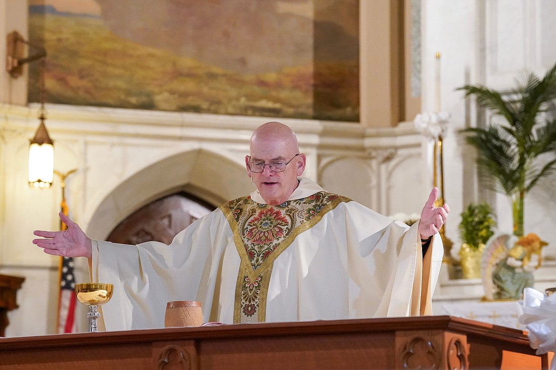 Father Liam O’Doherty, OSA, presides over Mass at St. Mary of the Assumption Church in Waterford before the Augustinians withdrew from the Diocese of Albany on June 2. (Cindy Schultz photos for The Evangelist)