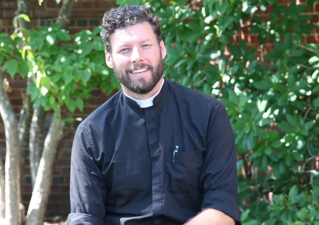 Father Daniel Quinn said it was a parishioner who noticed the calling in him and gave his name to the vocations director at the time. After that, he started seriously considering the priesthood. (Anne Frame photo)