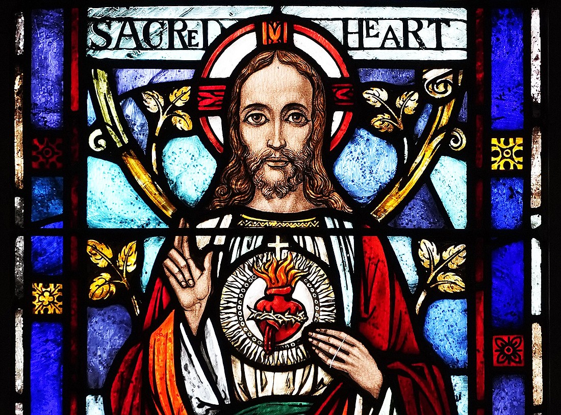 The Sacred Heart of Jesus is depicted in a stained-glass window at Our Lady Queen of Martyrs Church in the Forest Hills section of the Queens borough of New York. (OSV News photo/Gregory A. Shemitz)