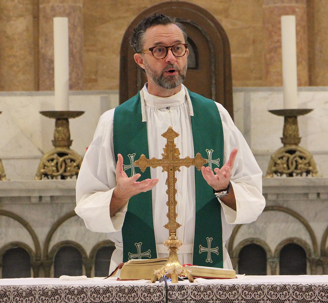 Father Daniel Corrou, SJ, shown celebrating Mass at St. Joseph’s Church in Beirut, said of Lebanon: “When it is working it is the very message of what we are about, a multi-religious, multi-ethnic society that can actually do the very real work of living together. When it is not working, it completely falls apart and you see multiple civil wars and inter-sectarian tensions that we see here.” (Photo courtesy of Jesuit Refugee Service)