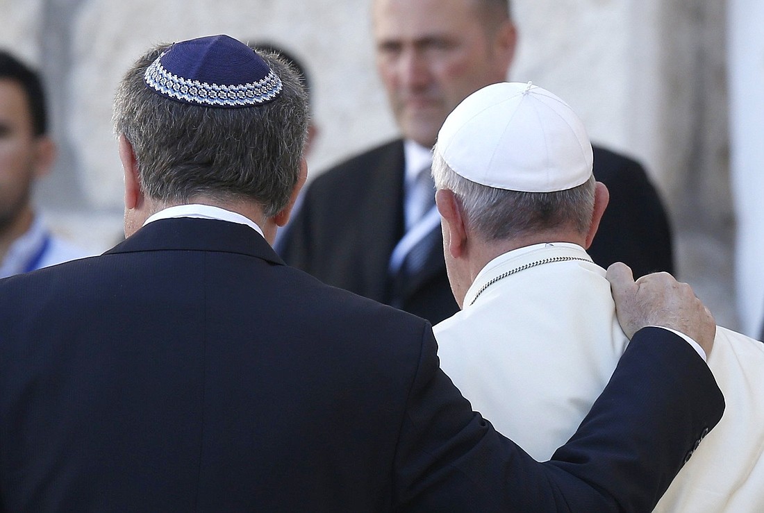 Rabbi Abraham Skorka of Buenos Aires, Argentina, and Pope Francis embrace after visiting the Western Wall in Jerusalem May 26, 2014. (CNS photo/Paul Haring)