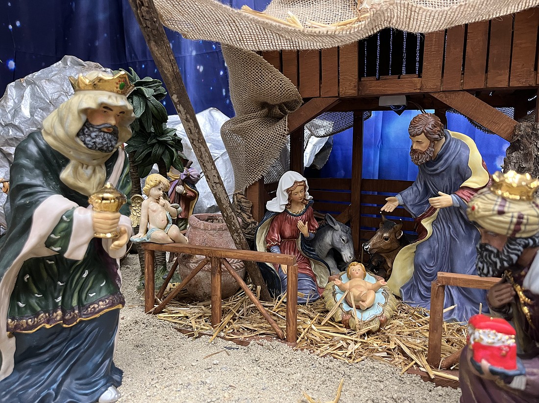 The Holy Family and one of the three wise men watch over Jesus laying in the manger. This historic scene is on display at the American Italian Heritage Museum, where local artist Joe Anastasio, 81, creates the famous display each year. (Emily Benson