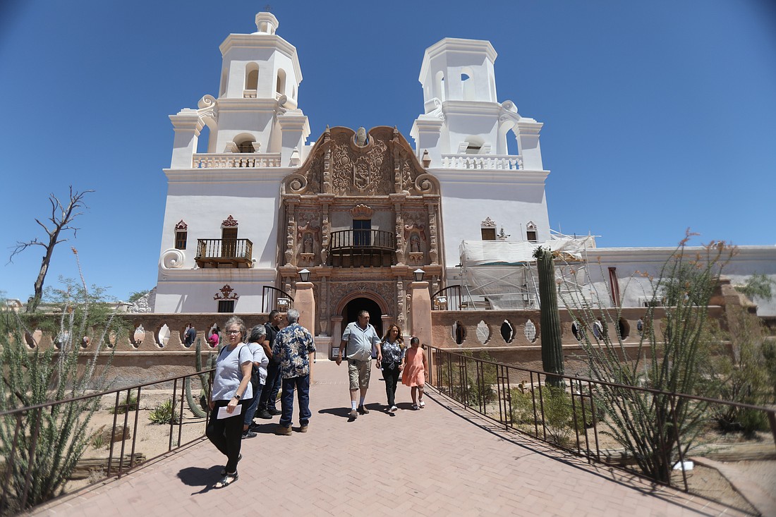 After attending Mass, people leave San Xavier del Bac Mission in Pima County, Ariz., outside Tucson, May 28, 2023. Ten state faith leaders -- including Catholic Bishops Edward J. Weisenburger of Tucson and John P. Dolan of Phoenix -- wrote an op-ed column published Dec. 28, 2024, in the Arizona Republic, denouncing reported proposals to allow immigration raids on churches, houses of worship, hospitals, schools and other locations currently deemed off-limits due to their sensitive nature once President-elect Donald Trump takes office. (OSV News photo/Bob Roller)