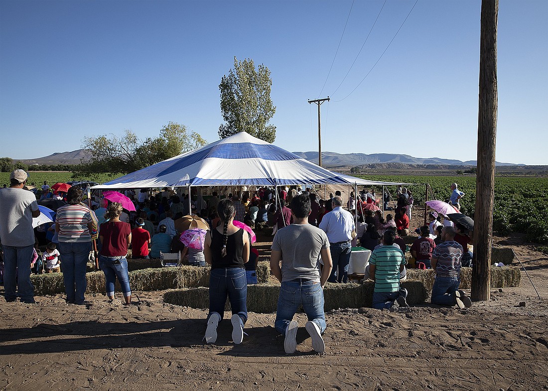 Migrant farmworkers attend an outdoor Mass Sept. 26, 2019, in Hatch, N.M. The Trump administration said Jan. 21, 2025, that it would rescind a long-standing policy preventing Immigration and Customs Enforcement agents from making arrests at what are seen as sensitive locations, including houses of worship, schools and hospitals. (OSV News photo/Tyler Orsburn)