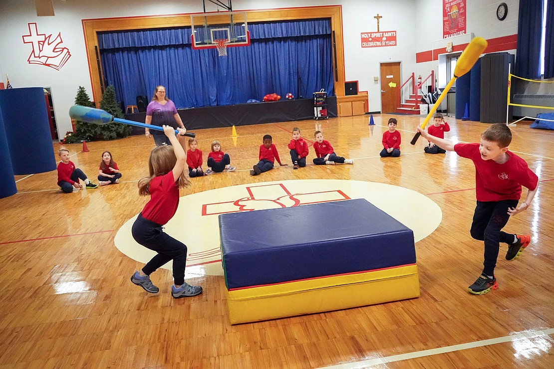 Kindergartners take part in a game during gym class on Jan. 16 at Holy Spirit School in East Greenbush. (Cindy Schultz photo for The Evangelist)